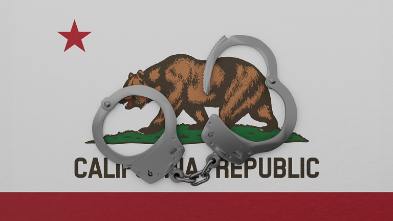 Handcuffs on a California flag