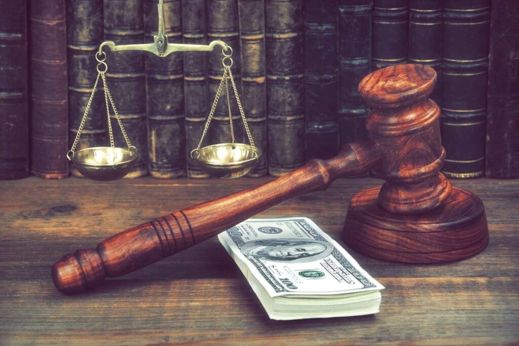 A gavel, scales and money