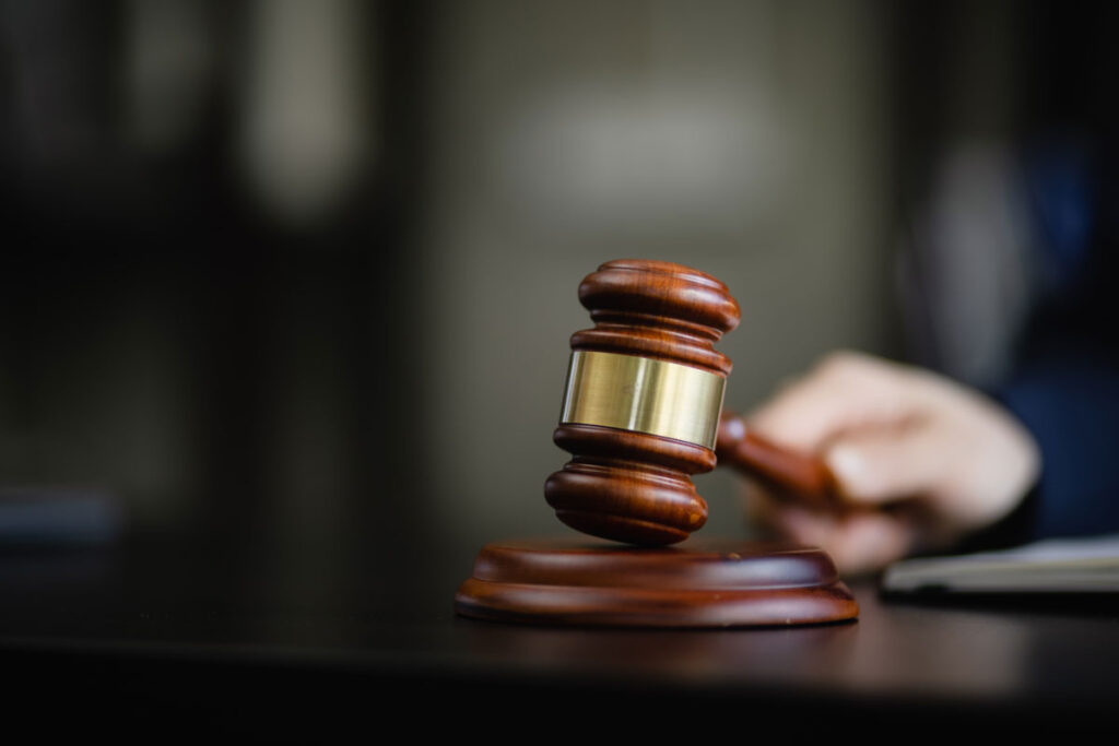 A close-up view of a gavel and block.