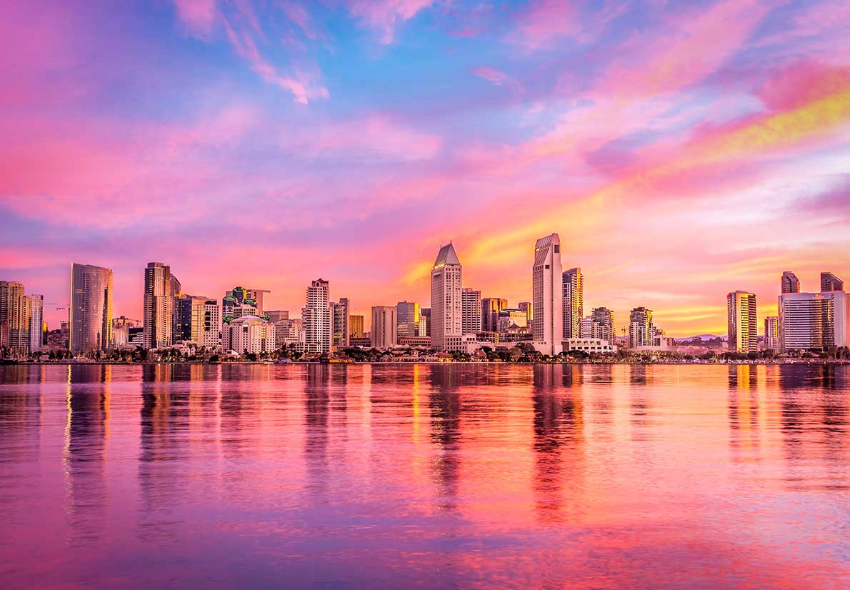 A view of the San Diego skyline at sunset.